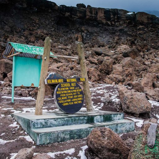 Socks Dry Out At School Hut Sign, 15,500 feet